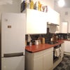 Photo 8: High ceilings, shared kitchen