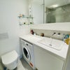 Photo 7: Washing machine and plenty of cupboard space
