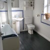 Photo 7: Bathroom with electric shower