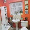 Photo 7: Bright bathroom