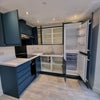 Photo 3: Kitchen showing fridge/freezer