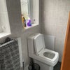 Photo 8: New Modern toilet