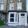 Photo 1: House front