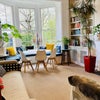 Photo 4: Dining room with bay window and two generous sofas to relax in