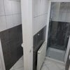 Photo 7: Downstairs shower & toilet