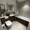 Photo 4: Shared bathroom with bath 
