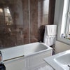 Photo 4: Bath with shower attachment