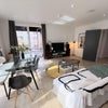 Photo 4: Large living space with direct sunlight through the day.