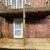 Photo 7: Downstairs bedroom entrance and decking