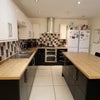 Photo 3: Kitchen with appliances and crockery included