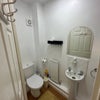 Photo 2: Private toilet with shower facility 