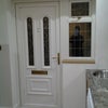 Photo 1: Inside entrance into kitchen 