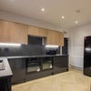 Photo 2: Communal Kitchen Area