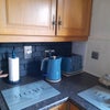 Photo 7: Spacious fully equipped kitchen /