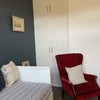 Photo 3: Bedroom: chair and cupboard