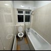Photo 3: Shared toilet front view
