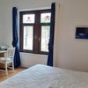 Photo 2: The window and desk of your room