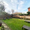 Photo 9: Large Communal Garden - sun loungers and  table and chairs