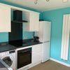 Photo 3: Kitchen with washing machine 