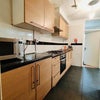 Photo 5: SHARED KITCHEN