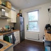 Photo 3: Upstairs kitchen