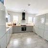 Photo 11: Communal Downstairs Kitchen 