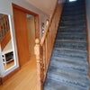 Photo 6: Hallway - stairs leading up to available room