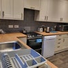 Photo 2: Large well equipped kitchen