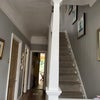 Photo 2: Entrance hall - back garden just visible