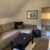 Photo 3: Sitting room with corner sofa and TV