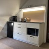 Photo 5: Kitchen area with dining table and chairs