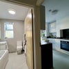 Photo 4: View from hallway to bathroom and kiitchen