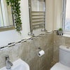 Photo 12: Chrome towel rad, shaver point, window & extractor