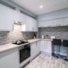 Photo 9: Kitchen communal area
