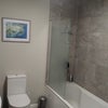 Photo 2: 'Family' Bathroom
