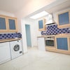 Photo 5: Very Large Kitchen with Table and Chairs