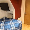 Photo 7: Bedroom 4 with LCD TV, double bed, double wardrobe, desk, chest of drawers