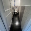 Photo 7: Donwstairs WC
