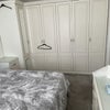 Photo 3: The other side of the bedroom with the bay windows 