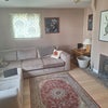Photo 5: Living room with wood burner