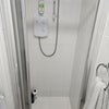 Photo 7: Downstairs toilet and shower