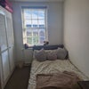 Photo 1: Bedroom overlooking sainsburys, costa and flour pot cafe- perfect location with busses 2mim from hou