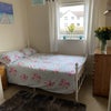 Photo 2: Room now has laminate flooring 