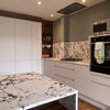 Photo 8: Kitchen - stove top, stove, cabinets, fridge