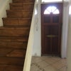 Photo 9: the flat is set over 2 floors (the room available is on the second / top floor)