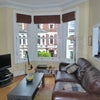 Photo 2: Lounge and kitchen