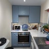 Photo 2: Well equipped kitchen, with washer/dryer and dishwasher