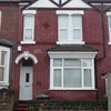 Photo 7: Exterior of house