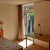 Photo 6: "downstairs" bedroom