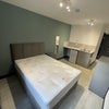 Photo 1: Bedroom with kitchenette